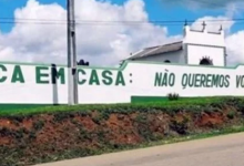 Photo of No muro do cemitério: “fica em casa. Não queremos você aqui”