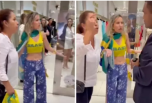 Photo of Seguranças de shopping de luxo abordam mulher vestindo bandeira do Brasil